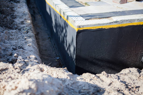 Professional Waterproofing technician working in Springfield, MN